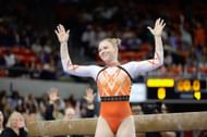 Jade Carey after performing in the beam balance apparatus during the Oregon State Beavers' clash against Auburn (Image via: Getty Images)